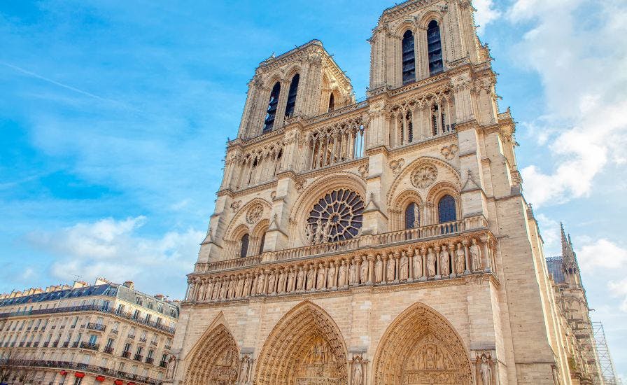 Iconic Notre-Dame Cathedral in Paris, France with Gothic architecture and flying buttresses.