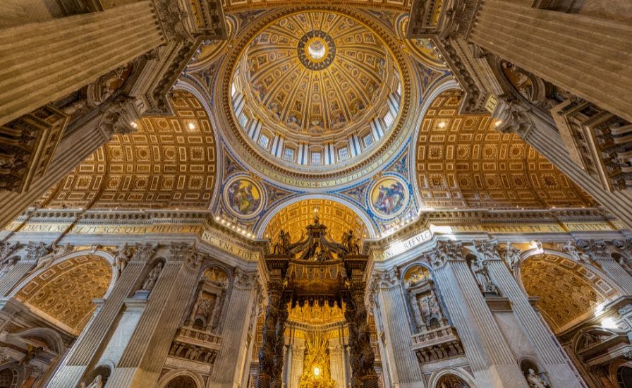 St. Peter Basilica's dome and statues in the cathedral