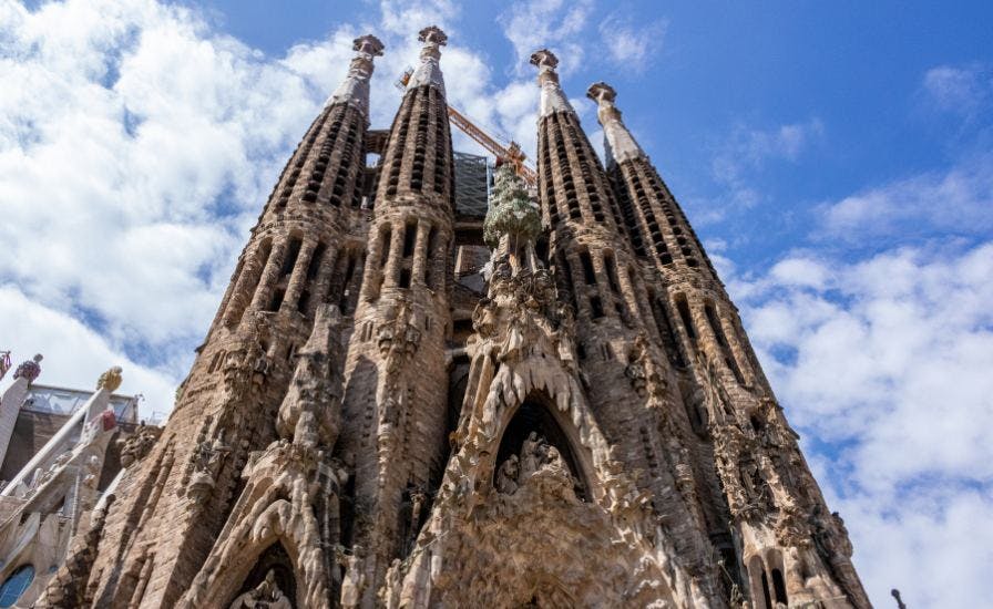 Exterior view of Sagrada Família, a famous basilica in Barcelona, Spain, known for its intricate architecture and stunning design
