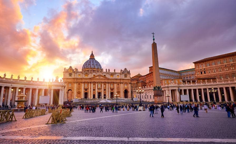 A stunning sunset over Vatican City, with views inside St. Peter's Basilica