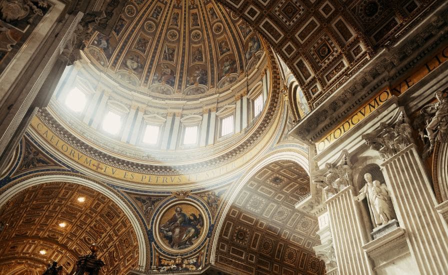 Interior-of-St.-Peter's-Basilica-with-ornate-ceiling-and-dome