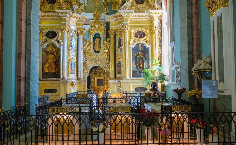 Interior of church with gold and blue walls, St. Peter's Tomb